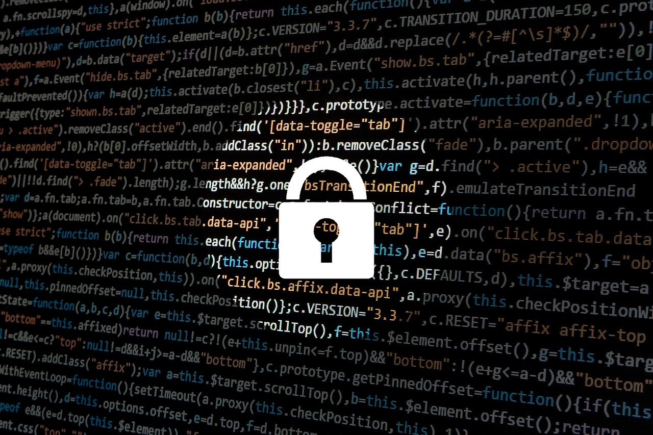 Computer code behind a white lock image